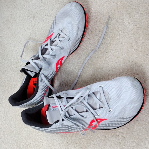 Saucony Shoes - Saucony women's silver and red track shoes. Mint condition. Size 9
